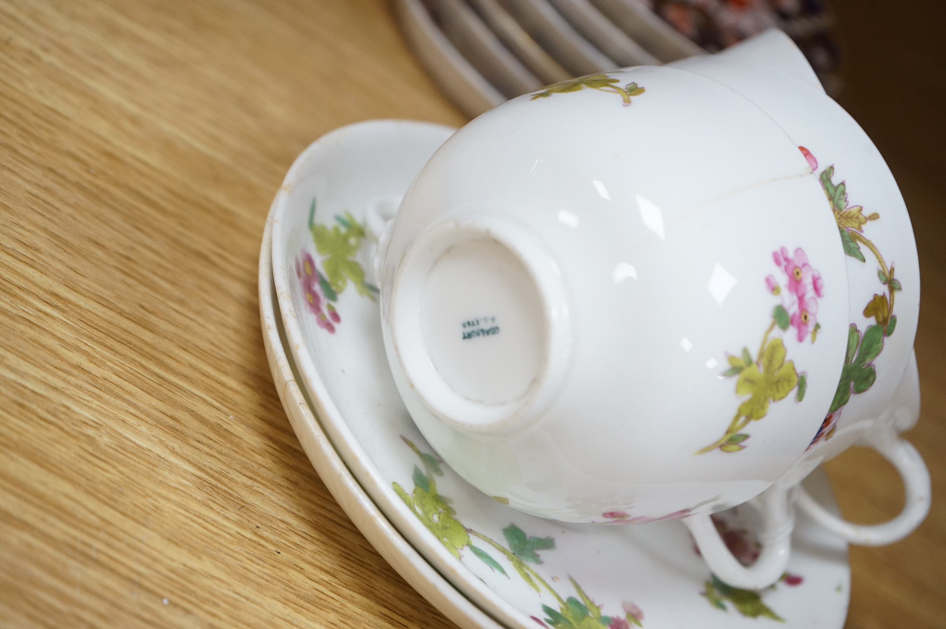 An English part teaset, c.1825 and six Royal Crown Derby coffee cans and saucers etc. Condition - some items cracked chipped and losses to gilding, teapot cover finial broken